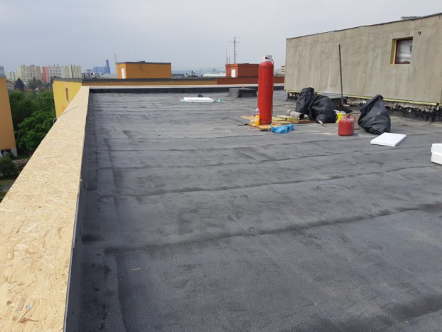 Rekonstrukce ploché střechy panelového domu Praha 4